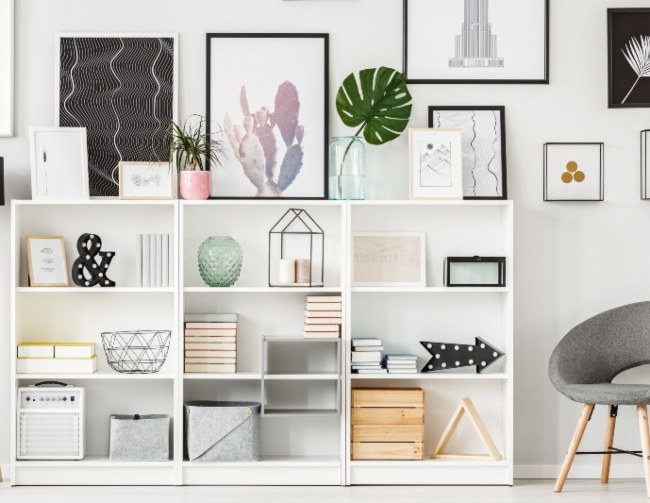 Wall art and various storage furniture like shelves and cabinets in an Edmonton, AB home